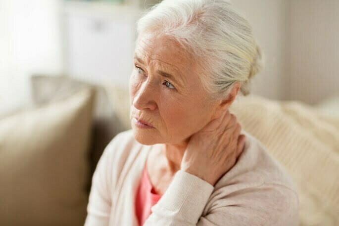 Old Women Suffering From Neck Pain