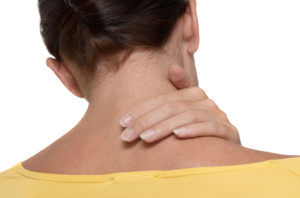 Woman Holding Her Neck In Pain
