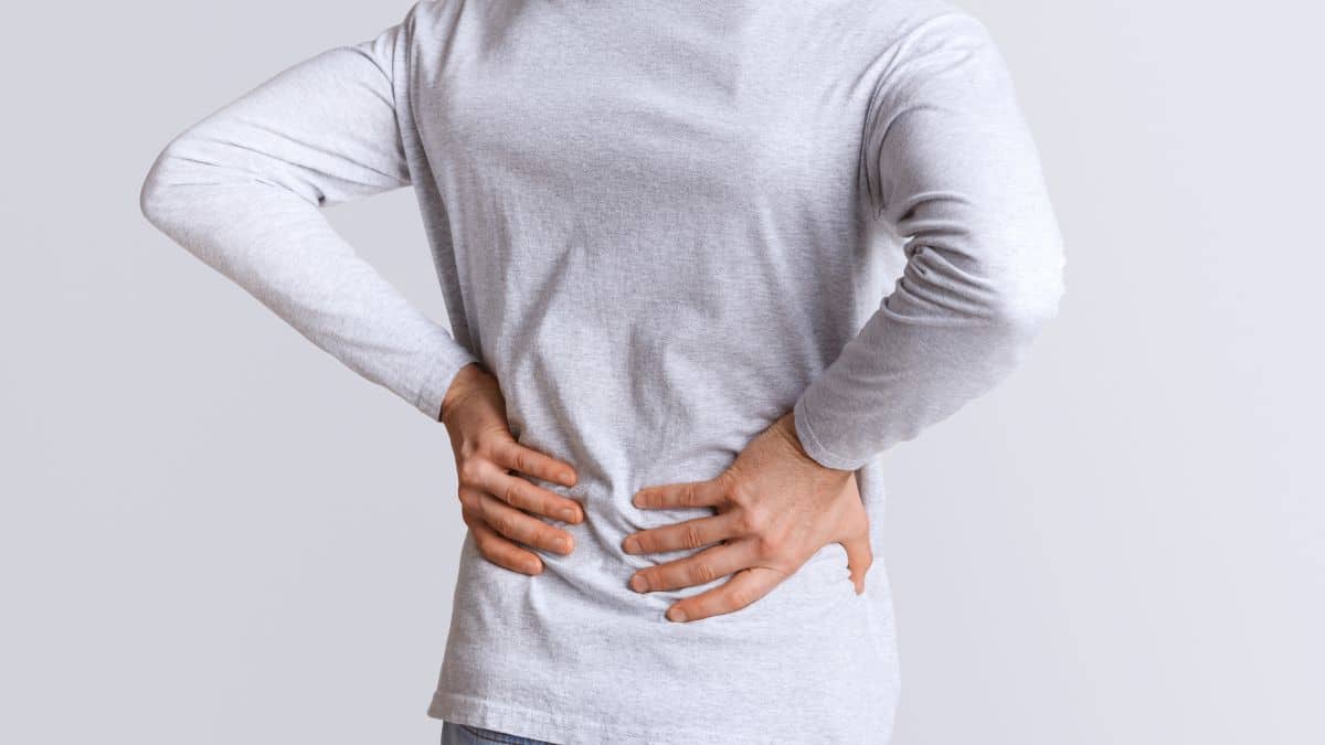 Why Does Standing for Extended Periods Cause Lower Back Pain?