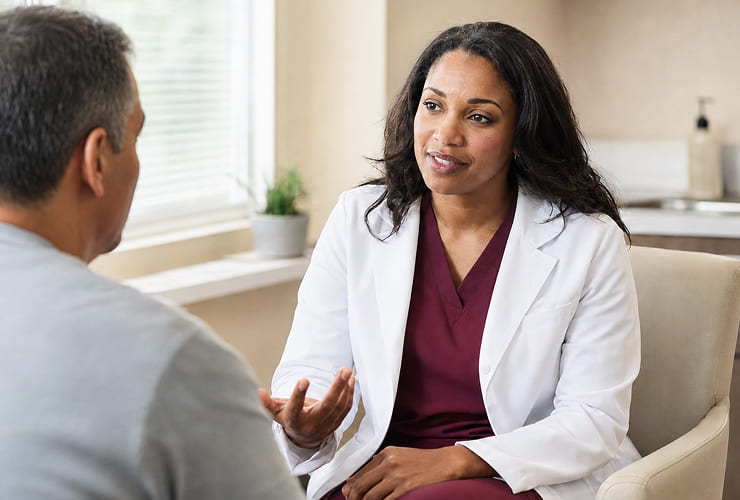 Physician discussing care with a patient